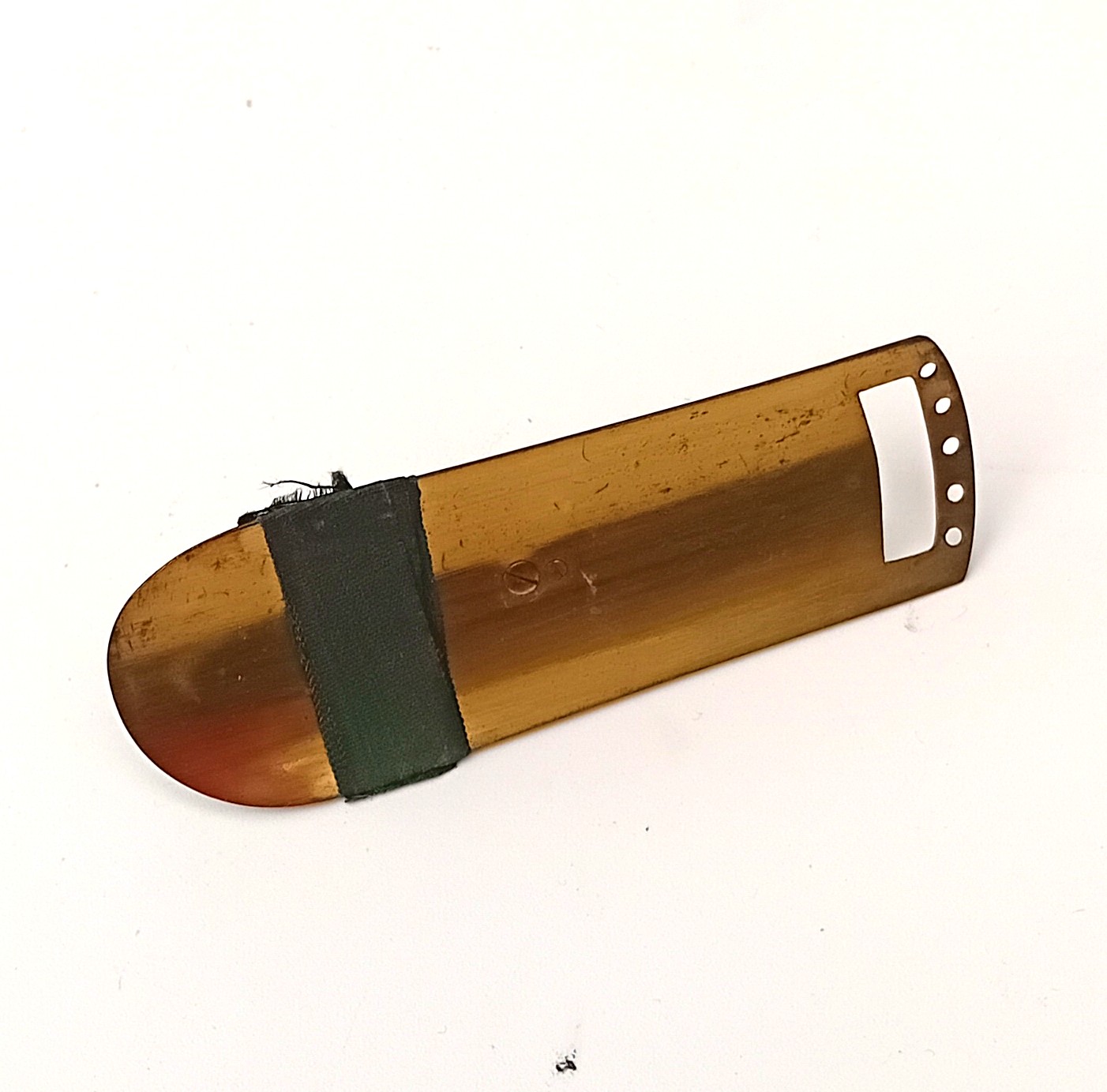 Brass frog plate for microscope.