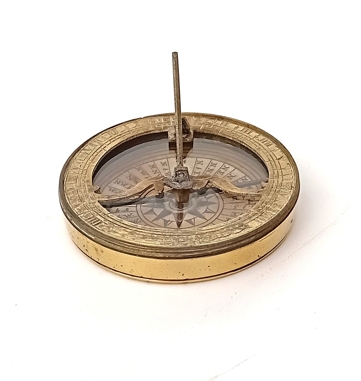 A two inch pocket compass sundial. - Fleaglass