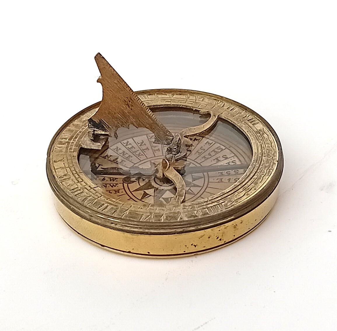 A two inch pocket compass sundial. - Fleaglass